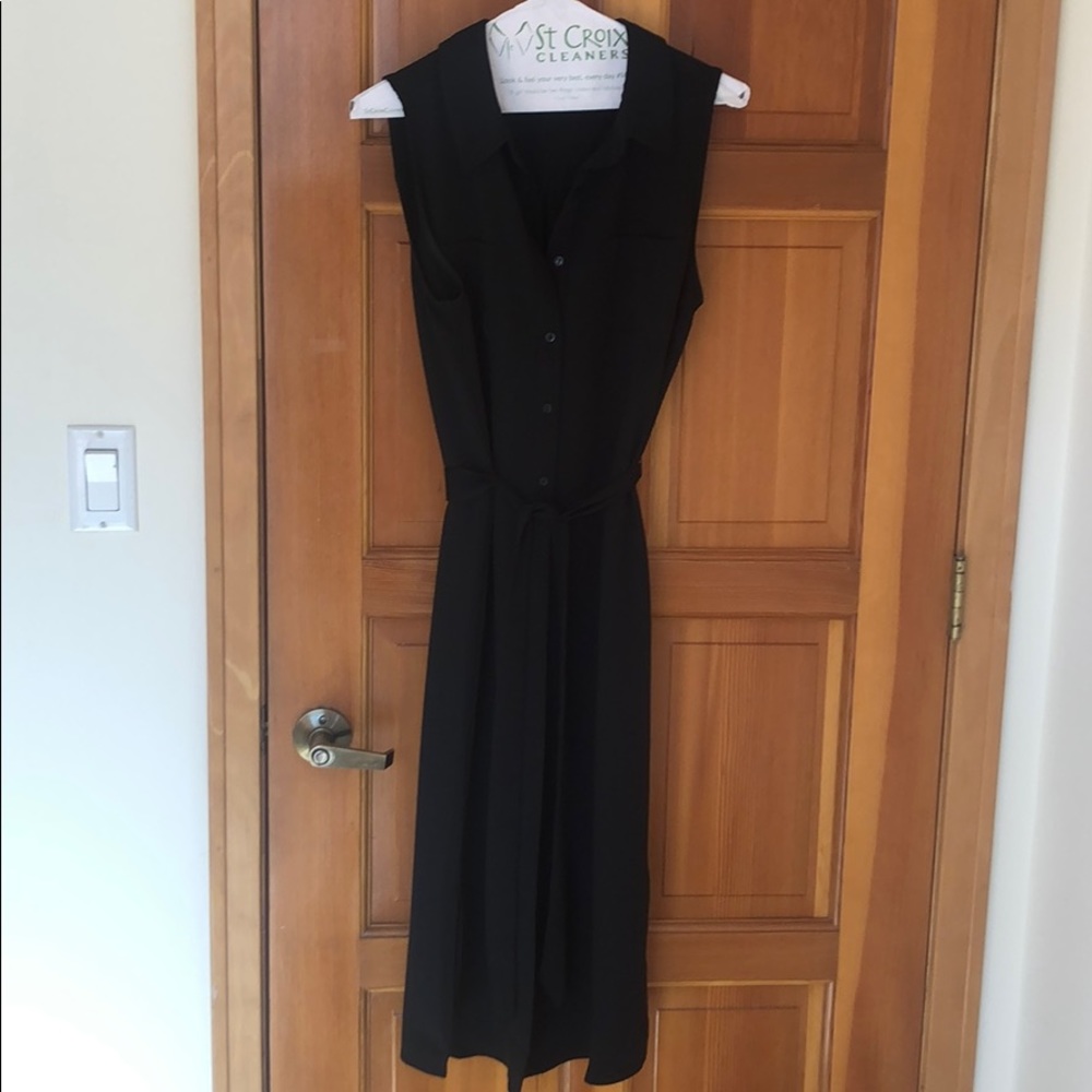 Sleeveless black button up dress with tie
